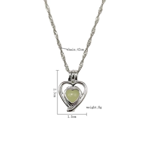 Cute luminous heart necklace with silver chain and green glowing stone pendant for women