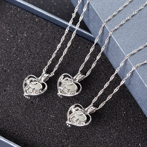 Luminous elephant heart necklace with glow stone pendant in silver water wave chain