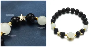 Detailed close-up of blue sandstone and luminous fluorite beads with gold star moon charms