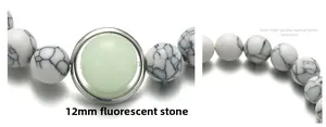 Detailansicht der 12mm Leuchtperle und 8mm weißen Natursteinperlen auf dem Armband