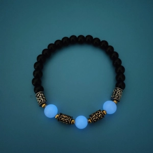 Bracelet en obsidienne avec filigrane argenté vintage et pierres bleues lumineuses