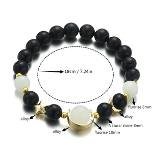 Star and moon glowing bracelet with blue sand stone beads and luminous fluorite