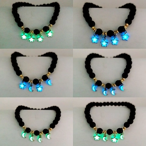 Leuchtende Black Onyx Stern und Mond Armbänder für Paare mit blauem und grünem Leuchteffekt