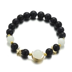 Minimalist luminous blue sandstone beaded bracelet with golden star and moon charms