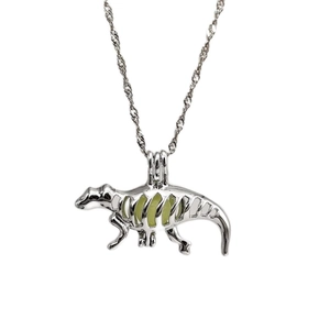 Luminous dinosaur pendant necklace in hollow silver alloy with glowing green beads