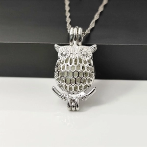 Minimalist owl luminous pendant necklace with hollow mesh silver metal design