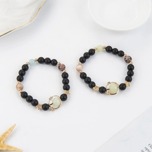 Luminous starry sky beaded bracelet set with Saturn charm and matte stone beads