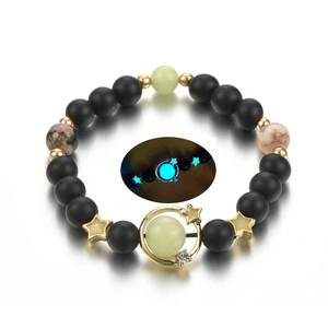 Luminous starry sky beaded bracelet featuring black frosted stones and gold planet charms