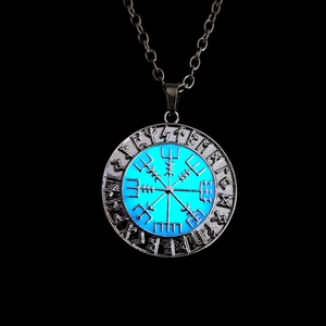 Luminous Viking compass necklace with blue glow and Nordic runes on silver pendant