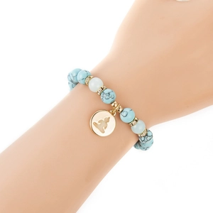 Leuchtendes Türkis Yoga Armband mit goldenem Buddha-Anhänger und Strass-Zwischenperlen
