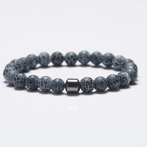 8mm natural map stone beaded bracelet with black magnetic cylinder bead on white background