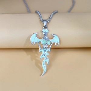 Gothic skull necklace with bat wings and glowing pendant on minimalist background