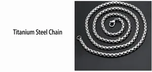 Detailed close-up of a silver titanium steel box chain with a sturdy lobster clasp