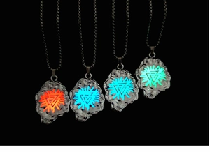 Luminous Viking rock pendants in four glow colors with engraved triangle symbols