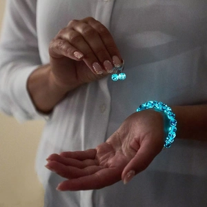 Luminous blue crystal bead bracelet and earrings set with healing glow effect
