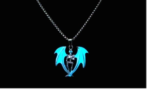 Luminous skull pendant with blue glowing bat wings on a metallic chain necklace