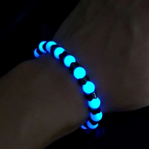 Glow-in-the-dark beaded bracelet with luminous blue and black beads for men and women