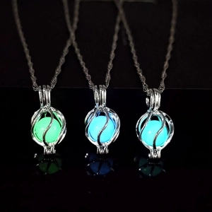 Luminous planet planet necklace with glowing fluorite stone and silver water wave chain link