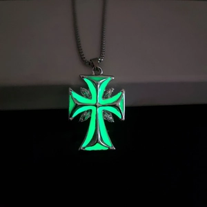 Luminous cross pendant necklace with green glow and silver metal leaf textures