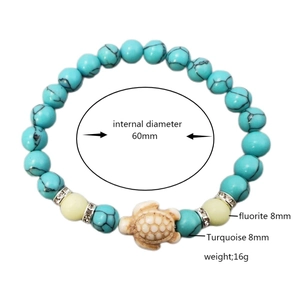 Luminous turtle bracelet with 8mm turquoise beads and sparkling rhinestone spacers