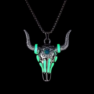 Detailed punk bull skull pendant with blue stone and luminous green glow-in-the-dark finish