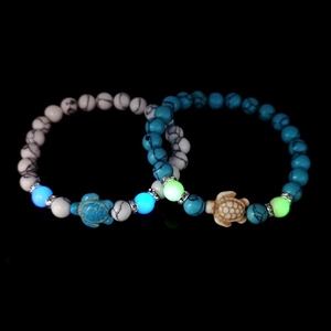 Luminous turtle beaded bracelets with turquoise stones and glowing marble beads