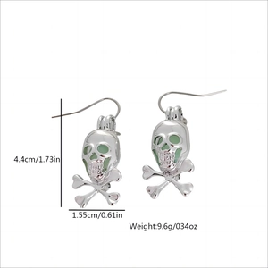 Luminous skull and crossbones drop earrings in silver alloy with green glow effect