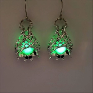 Luminous Halloween bat earrings with green glow-in-the-dark beads and hollow design