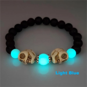 Bracelet tête de mort d'Halloween avec perles de lave noires et pierres lumineuses