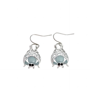 Luminous hollow bat drop earrings in silver metal with light blue glow-in-the-dark beads