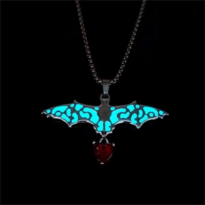Gothic bat necklace with blue luminous hollow wings and a red heart-shaped glass gemstone