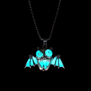Luminous Halloween devil wing pendant necklace with blue glowing teeth and eyes in the dark