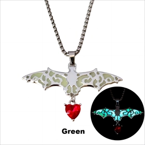 Gothic Halloween bat necklace with green luminous effect and red heart-shaped gemstone