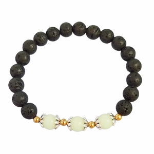 Luminous lotus lava stone bracelet featuring glow beads and vintage ethnic metal spacers