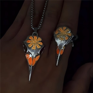 Luminous Viking bird skull necklace and ring set with orange glowing Vegvisir symbol