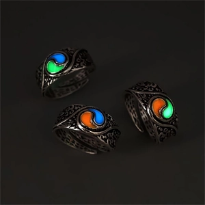 Vintage glow-in-the-dark Tai Chi ring with embossed patterns and adjustable band