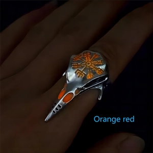 Viking raven skull ring with orange red luminous Vegvisir compass in dark light