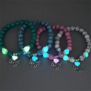 Luminous beaded Super Mom heart bracelets set with turquoise beads and glow effect