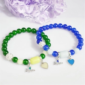 Luminous heart beaded bracelet set with Mom charm in vibrant blue and green tones