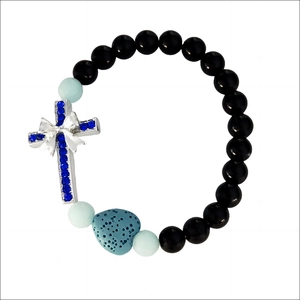 Bracelet croix fait main avec perle lumineuse en cœur et pierres volcaniques noires