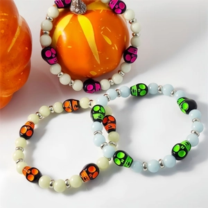 Luminous Halloween skeleton bead bracelets set featuring colorful skulls glowing in the dark