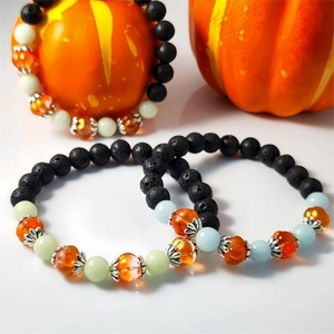 Luminous Halloween pumpkin beaded bracelet with black lava stone and glowing glass beads