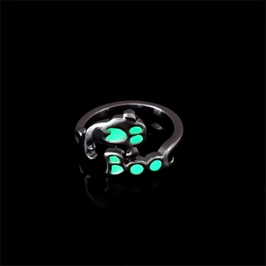 Macro detail of Halloween adjustable ring with glow-in-the-dark Boo and cat claw design
