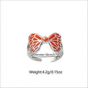 Luminous orange butterfly adjustable ring in silver finish with size and weight specs