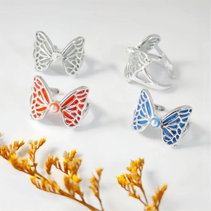 Luminous butterfly open rings with enamel wings and central pearl decoration