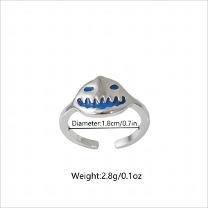 Luminous pumpkin face ring with blue enamel in silver-tone finish for Halloween