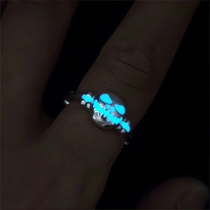 Luminous skeleton pumpkin ring in silver with glowing blue light for Halloween