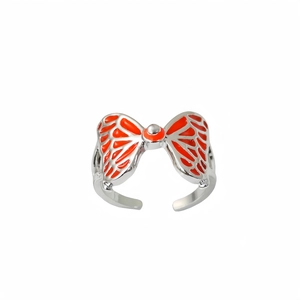 Luminous orange butterfly ring with adjustable silver band for a hip-hop trendy look