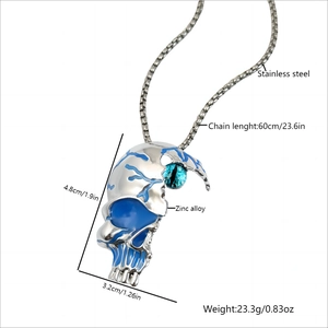 Luminous skull necklace with blue eye pendant on a stainless steel chain 60cm long