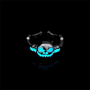 Close-up of a glowing blue alien creature ring with adjustable black metal band